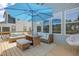 Charming backyard deck with outdoor seating, an umbrella, and stylish decor at 155 Annabelle Branch Ln, Apex, NC 27523