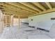 Patio with stone pavers, wood beams, stairs, and outdoor seating area at 155 Annabelle Branch Ln, Apex, NC 27523