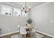 Charming dining area features modern lighting, neutral walls, and a cozy atmosphere at 1641 Glazebrook Dr, Wake Forest, NC 27587