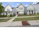 Charming two-story home with neutral siding, a welcoming porch, and well-manicured landscaping at 1641 Glazebrook Dr, Wake Forest, NC 27587