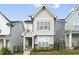 Charming two-story home with neutral siding, a welcoming porch, and well-manicured landscaping at 1641 Glazebrook Dr, Wake Forest, NC 27587