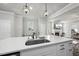 Bright kitchen features stainless steel appliances, undermount sink and quartz countertops, perfect for entertaining at 1641 Glazebrook Dr, Wake Forest, NC 27587