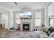 Sunlit living room showcasing a fireplace, recessed lighting, and an open design at 1641 Glazebrook Dr, Wake Forest, NC 27587