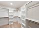 Spacious walk-in closet with custom shelving and ample storage space for clothing and accessories at 1641 Glazebrook Dr, Wake Forest, NC 27587