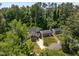 Aerial shot highlighting a home's layout, lush surroundings, and clearly defined property lines at 2003 Wa Wa Ave, Durham, NC 27707