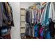 Organized walk-in closet with ample storage and shelving for clothes, shoes, and accessories at 2003 Wa Wa Ave, Durham, NC 27707