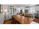 Inviting dining area with a large table that connects to the kitchen and living room for easy entertaining at 2003 Wa Wa Ave, Durham, NC 27707
