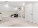 Cozy bonus room featuring vaulted ceilings, recessed lighting and a comfortable seating area at 2014 Anna Lilley Dr, Fuquay Varina, NC 27526