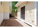 View of back entrance to house with gravel and wooden fence at 216 N Bloodworth St, Raleigh, NC 27601