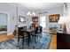 Elegant dining room with hardwood floors, stylish decor, and ample seating at 216 N Bloodworth St, Raleigh, NC 27601