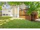 This two-story home features a back deck, green backyard, and vintage exterior at 216 N Bloodworth St, Raleigh, NC 27601