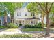 Beautiful two-story home with a charming front porch and well-manicured lawn at 216 N Bloodworth St, Raleigh, NC 27601