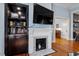 Cozy fireplace with a modern design and built-in shelves, perfect for relaxing and displaying decor at 216 N Bloodworth St, Raleigh, NC 27601