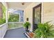 Inviting front entrance with covered porch and lush greenery at 216 N Bloodworth St, Raleigh, NC 27601