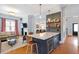 Eat-in kitchen island overlooks the living room with fireplace at 216 N Bloodworth St, Raleigh, NC 27601