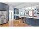 Spacious kitchen with a wine fridge, stainless steel appliances, and open concept design at 216 N Bloodworth St, Raleigh, NC 27601
