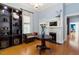 Bright formal living room with fireplace, shelving and hardwood floors at 216 N Bloodworth St, Raleigh, NC 27601