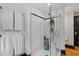 This frameless shower features neutral tile, glass door, and mounted showerhead at 216 N Bloodworth St, Raleigh, NC 27601