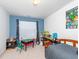 Playful bedroom featuring fun decor, a comfy bed, and great natural light at 216 Ruby Walk Dr, Morrisville, NC 27560