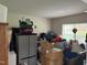 Cluttered bedroom with neutral walls and natural light streaming through the window at 216 Ruby Walk Dr, Morrisville, NC 27560
