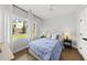 Inviting bedroom with natural light and a relaxing neighborhood view at 221 Woodsborough Pl, Raleigh, NC 27601
