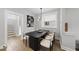 Chic dining room with stylish table, comfortable seating, and modern light fixture at 221 Woodsborough Pl, Raleigh, NC 27601
