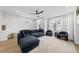 Inviting living room with modern decor and large windows at 221 Woodsborough Pl, Raleigh, NC 27601