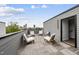 Rooftop deck with comfortable seating offering an expansive city view at 221 Woodsborough Pl, Raleigh, NC 27601