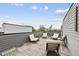 Rooftop deck featuring white chairs and a beautiful city view at 221 Woodsborough Pl, Raleigh, NC 27601