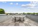 Rooftop deck featuring a table with four chairs at 221 Woodsborough Pl, Raleigh, NC 27601