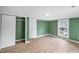 This bedroom offers fresh paint, new flooring, large closet, and natural lighting at 223 Hall Ave, Burlington, NC 27217