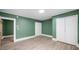 Bedroom offering ample space with natural light and closet storage at 223 Hall Ave, Burlington, NC 27217