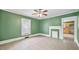 Versatile empty room with tiled floor, offering potential for customization and various uses at 223 Hall Ave, Burlington, NC 27217