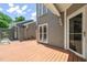 Cozy backyard featuring a wood deck for outdoor relaxation and entertainment at 2303 Upper Oaks Way, Raleigh, NC 27615