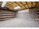 Spacious unfinished basement featuring concrete walls and floors, ready for your personal touch at 2303 Upper Oaks Way, Raleigh, NC 27615