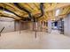 Unfinished basement providing a blank canvas for customization with exposed ceiling at 2303 Upper Oaks Way, Raleigh, NC 27615