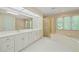 Spacious bathroom with double vanity, soaking tub, and separate shower at 2303 Upper Oaks Way, Raleigh, NC 27615