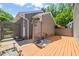 Home exterior with deck, decorative lattice, landscaped with gravel and walkway at 2303 Upper Oaks Way, Raleigh, NC 27615