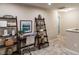 Upstairs hallway featuring a desk and shelving, providing a functional and stylish workspace at 238 Oak Meadow Ln, Angier, NC 27501
