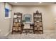 Upstairs hallway featuring a desk and shelving, providing a functional and stylish workspace at 238 Oak Meadow Ln, Angier, NC 27501