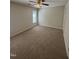 Bedroom with neutral walls, plush carpet and ceiling fan at 2520-102 Gordon Glen Ct, Raleigh, NC 27617