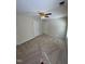 Spacious bedroom with neutral walls, carpet and a ceiling fan at 2520-102 Gordon Glen Ct, Raleigh, NC 27617