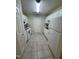 Efficient kitchen with white appliances and tile flooring at 2520-102 Gordon Glen Ct, Raleigh, NC 27617