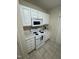 Well-maintained kitchen with modern appliances and ample storage at 2520-102 Gordon Glen Ct, Raleigh, NC 27617