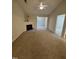 Cozy living room features a fireplace, neutral paint, ceiling fan and carpet flooring at 2520-102 Gordon Glen Ct, Raleigh, NC 27617