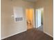 Cozy bedroom with neutral walls, carpet, and access to an ensuite bathroom at 2521 Friedland Pl # 301, Raleigh, NC 27617