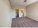 Comfortable bedroom with carpet flooring and access to an ensuite bathroom at 2521 Friedland Pl # 301, Raleigh, NC 27617