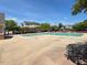 Community pool with multiple chairs for residents to relax in at 2521 Friedland Pl # 301, Raleigh, NC 27617