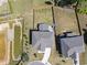 Expansive aerial view shows home, yard, fence, pond, and outdoor recreational area at 2527 Sidewinder Ct, Apex, NC 27523