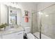 Bathroom featuring a glass-enclosed shower, granite counters, and modern fixtures at 2527 Sidewinder Ct, Apex, NC 27523